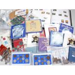 Collection of coin and stamps, to include various denominations, some cased sets, together with