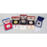 Silver proof coins, to include Crowns, Isle of Man £1, Guernsey Royal Visit and St Helena, (5)