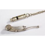 Naval Bosun's whistle, with arrow mark, together with a Metropolitan example, (2)