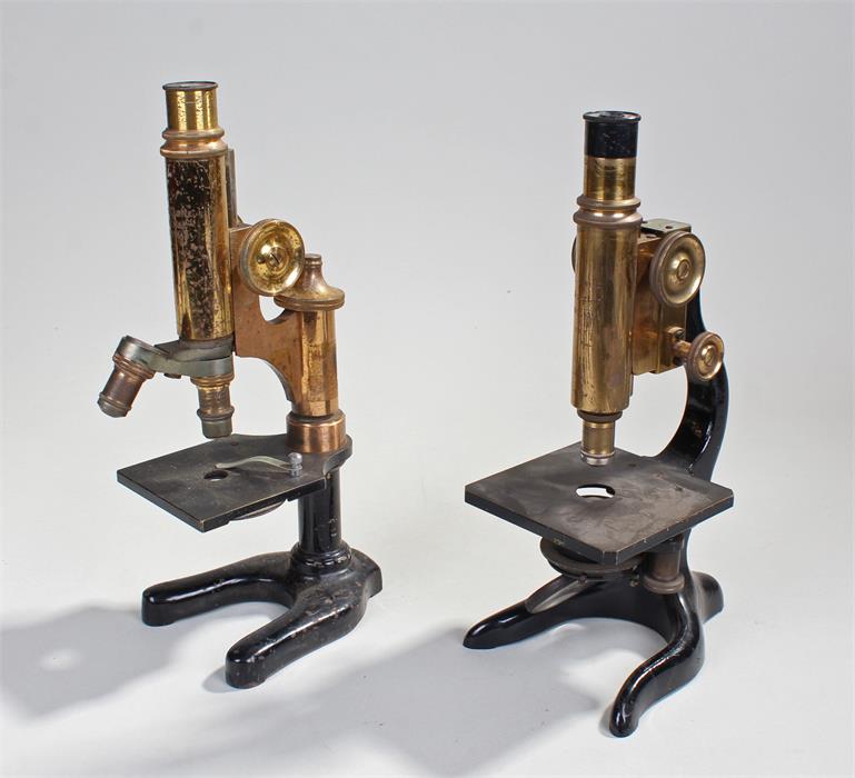 Two microscopes, to include a Ernst Leitz Wetxlar example numbered 197543, together with another