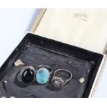 Three silver rings, onyx, marcasite and opal, (3)