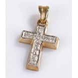 9 carat gold diamond set cross, the white gold front set with diamonds