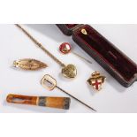 Two yellow metal stick pins in Spiegelhalter & Co box and another,a meerschaum cigarette holder, two