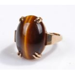 9 carat gold tigers eye ring, the oval tigers eye with four claws