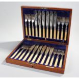 Elkington & Co silver plated canteen of fish knifes and forks, the set of twelve with ivory handles