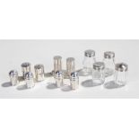 Miniature silver salt and pepper pots, various dates and makers, to include two glass pairs, a