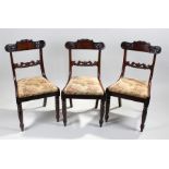 Set of five William IV mahogany dining chairs, the bar backs with scroll ends and carved acanthus