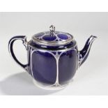 Lenox porcelain and silver overlaid teapot, the blue porcelain body and lid with oval and diamond
