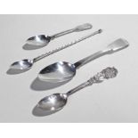 Four silver spoons, various dates and makers, to include two fiddle pattern spoons, a shield