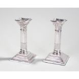 Elizabeth II pair of silver column candlesticks, Birmingham 1997, maker AM W, the Corinthian