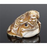 19th century Japanese ivory figure of Gamma Sennin, 19th Century, the Gamma on the back of a toad,