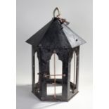 Large lantern, in painted black metal with a pointed top and arched windows, 60m high