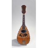 Mandolin, with rounded body, mother of pearl decoration and tortoiseshell decoration