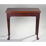 George III mahogany tea table, the rectangular top above a deep frieze raised on tapering legs and