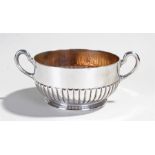 Victorian silver twin handled bowl, London 1889, maker Walter & John Barnard, the silver gilt
