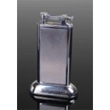 Dunhill silver plated table lighter, with engine turned decoration, R.H.Y.C. lettering to the