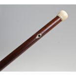19th Century ivory and rosewood child's walking cane, the ivory finial top above a tapering shaft,
