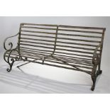 19th Century wrought iron garden bench, the scroll bar back above a conforming seat on scroll