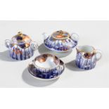 Japanese miniature Fukagawa porcelain tea set, decorated with blues, orange and gilt with lotus leaf