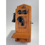 USA Cracraft-Leich wall hanging telephone, the oak case with hand set, twin bells and speaker,