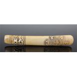 Japanese early 19th Century otoshizutsu type pipe case, the ivory case with a carved beast above a