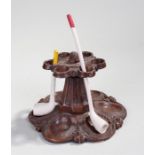 Papier mache pipe rack possibly French with two clay pipes. 19cm diameter at the base (3)