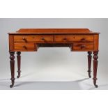 Victorian mahogany desk, the rectangular top above four drawers to the kneehole, raised on turned