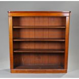 Victorian mahogany open front bookcase, the rectangular top with rounded corners above three