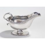 George V silver sauce boat, Chester 1915, makers mark rubbed, the gadrooned edge with an acanthus