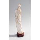 Large Chinese late 19th Century/early 20th Century ivory figure, carved as an elderly man with beard
