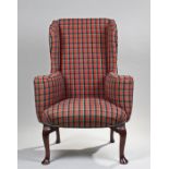 George I style early 20th Century wing armchair, the stuff over upholstered back and seat with