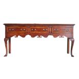 Late 18th Century style oak dresser base, the rectangular top above three frieze drawers and
