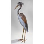 Large steel model of a Heron, with glass eyes and a rubbed effect yellow beak and grey body, 142cm