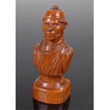 19th century boxwood carved bust possibly of a Tutor wearing a gown and high collar and with