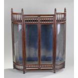 Late 19th century glazed display case of two glazed doors and glazed curved side panels, with turned