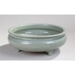 Large Chinese Longquan celadon tripod censer, probably Ming dynasty, thickly potted with a flared