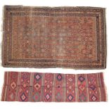 Persian runner, the red ground with geometric medallions, 284cm x 81cm, together with a Persian rug,