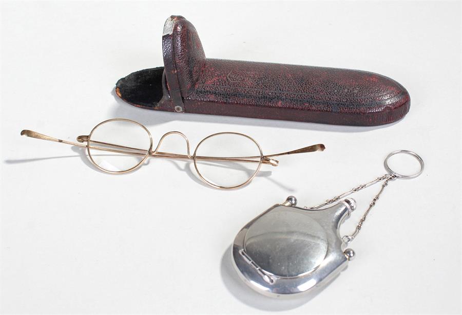 Pair of 9 carat gold spectacles, held within the leather clad case, together with a silver perfume