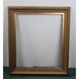 Gilt frame, with foliate decoration, frame size 83cm x 95cm