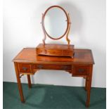 Yew wood side table, with a rectangular top above frieze drawers, together with a toilet mirror in