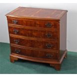 Yew wood chest of drawers, the bow front chest with a set of four long graduated drawers