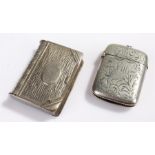 Two vesta cases, one in the form of a book the other engraved, (2)