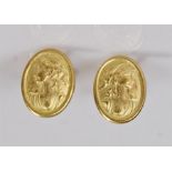 Pair of 18 carat gold earrings, with a classical lady to each, 1.1 grams
