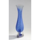 Large blue glass vase.