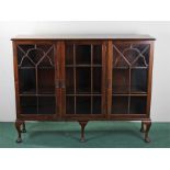 Mahogany display cabinet, with astragal glazed doors raised on claw and ball feet, 136cm