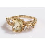 9 carat gold ring, set with a yellow stone to the centre, ring size N 1/2