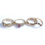 9 carat gold rings, to include a band, a sapphire ring, a cross over ring and stone set ring, (4)