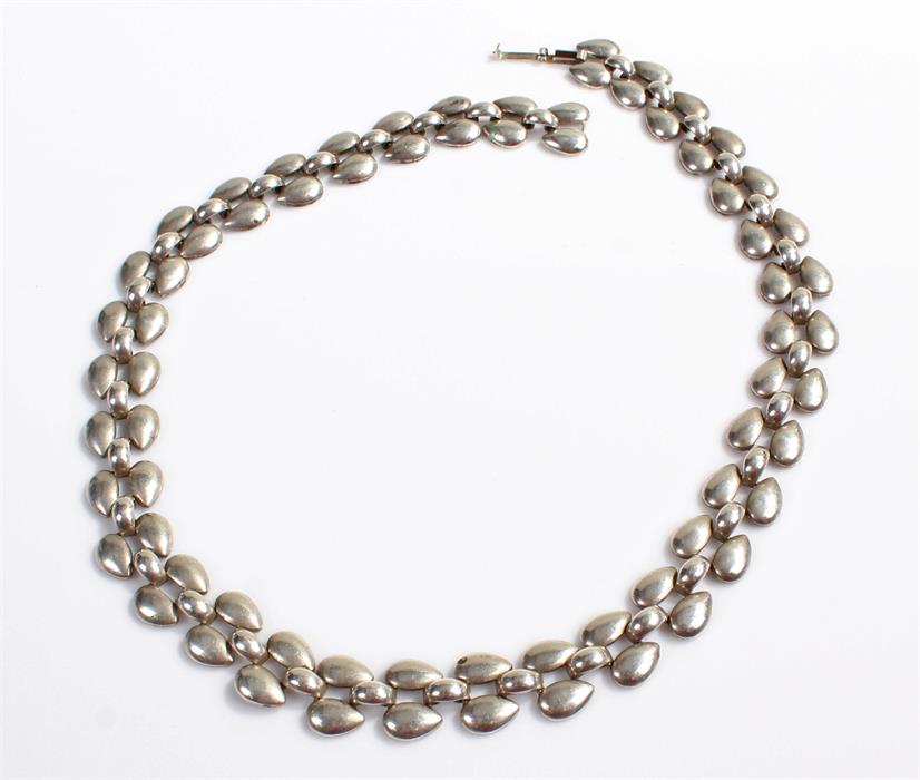 Silver necklace, stamped 800, with pear shape links, 57 grams, 46cm long