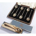 Cased set of silver coffee spoons, each with a coffee bean to the end, together with a silver spoon