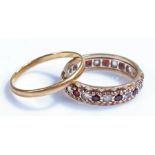 22 carat wedding band, 2 grams, together with a 9 carat gold eternity ring, (2)